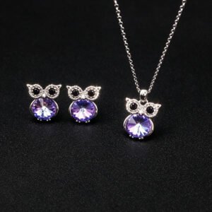 Wholesale owl crystal jewelry set featuring platinum plated copper with blue Swarovski element crystal body and pave zirconia eyes from JuneJewelry.com.