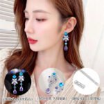 Tear drop CZ floral dangle earrings featuring multi-shaped geometric cubic zirconia, a teardrop crystal pendant, and 925 sterling silver posts