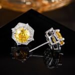 Geometric hexagon rose cut cubic zirconia stud earrings with a pave halo border and 925 sterling silver ear posts