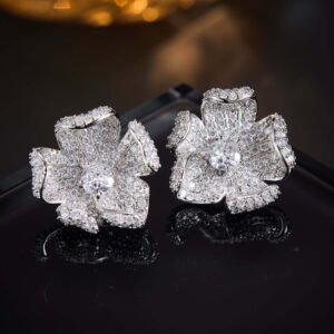 Statement 3D curved flower stud earrings fully encrusted with micro-pave cubic zirconia crystals, available in multicolor, lavender purple, and classic clear silver options.