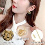 Filigree fan freshwater pearl earrings featuring intricate openwork lace design, central cubic zirconia accents, lustrous cultured pearl stud, and 925 sterling silver ear posts