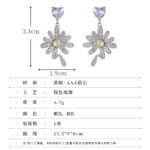 Heart CZ flower drop earrings featuring a heart-cut top gem, micro-paved cubic zirconia flower blossom dangle, yellow center stone, and 925 sterling silver ear posts