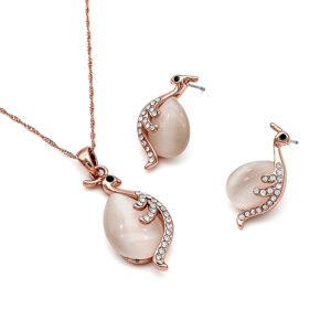 Wholesale royal peacock jewelry set in rose gold plated zinc alloy featuring teardrop cat eye stone body and pave crystal tail pendant necklace and stud earrings from JuneJewelry.com.
