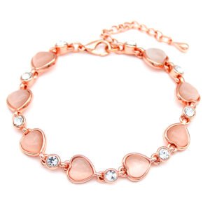 Wholesale heart cat eye bracelet in rose gold plated zinc alloy featuring heart cat eye stones and artificial crystal accents from JuneJewelry.com.