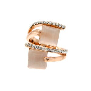 Wholesale dual square cat eye ring in rose gold plated zinc alloy featuring offset square cat eye stones and pave crystal bands from JuneJewelry.com.