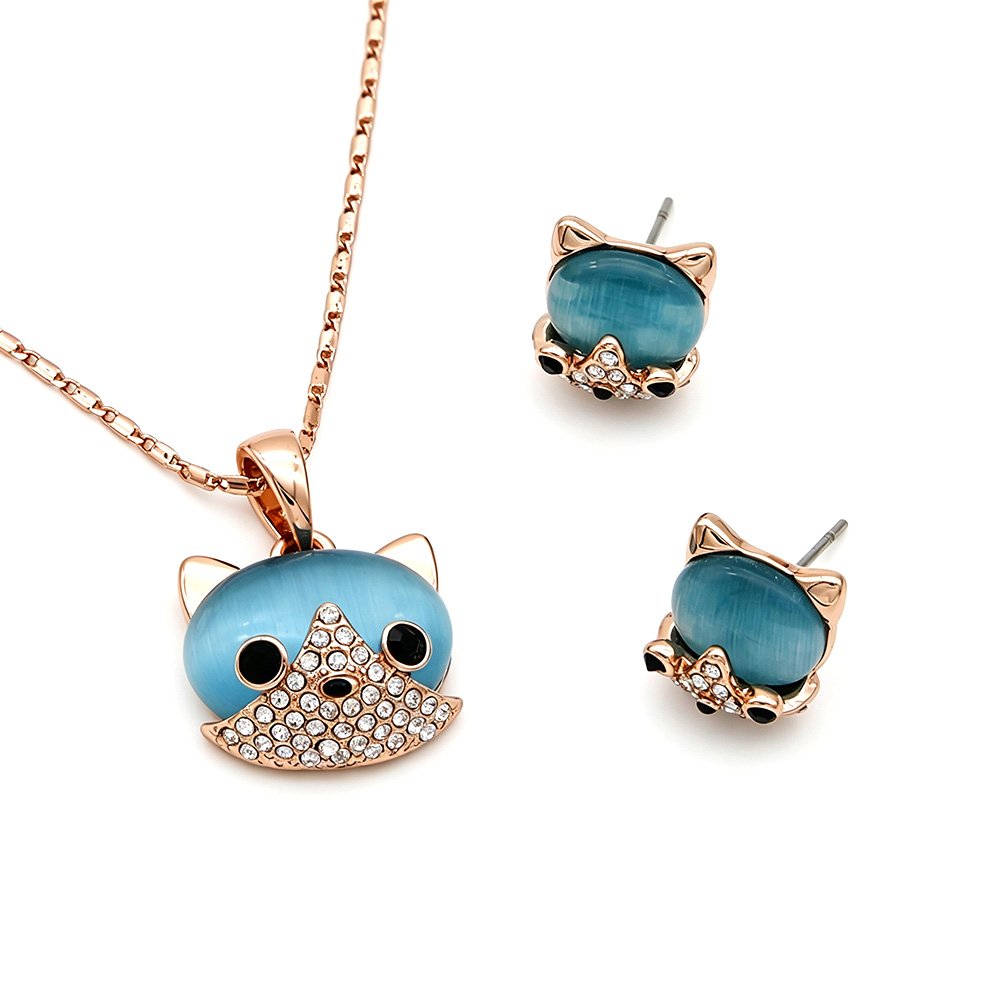 Wholesale blue fox jewelry set in rose gold plated zinc alloy with ocean blue cat eye stone and pave crystal face pendant necklace and stud earrings from JuneJewelry.com.
