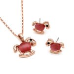 Wholesale rocking horse jewelry set in rose gold plated zinc alloy featuring cat eye stone body pendant necklace and matching stud earrings from JuneJewelry.com.