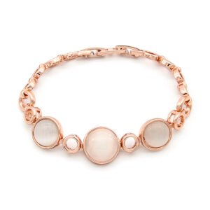 Wholesale round cat eye bracelet in rose gold plated zinc alloy featuring circular cabochon cat eye stones and fold-over clasp from JuneJewelry.com.