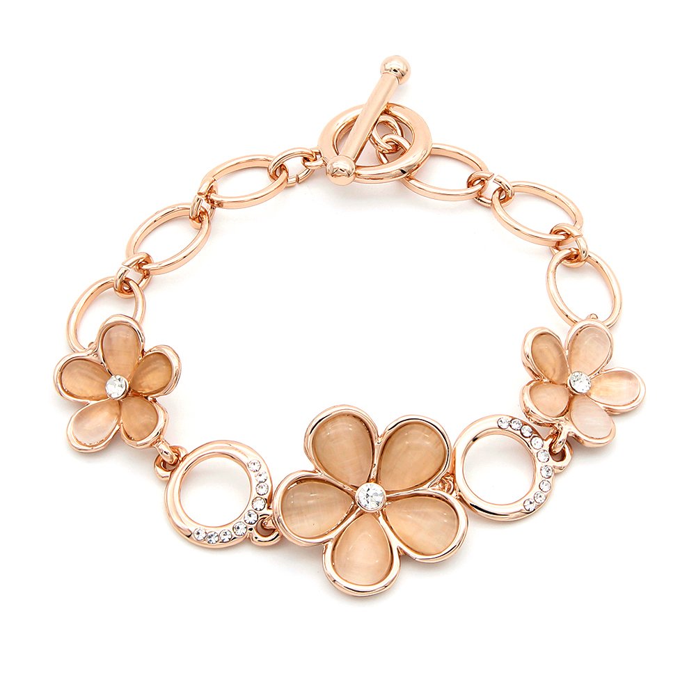 Wholesale flower cat eye bracelet in rose gold plated zinc alloy featuring peach cat eye stone petals and toggle clasp from JuneJewelry.com.