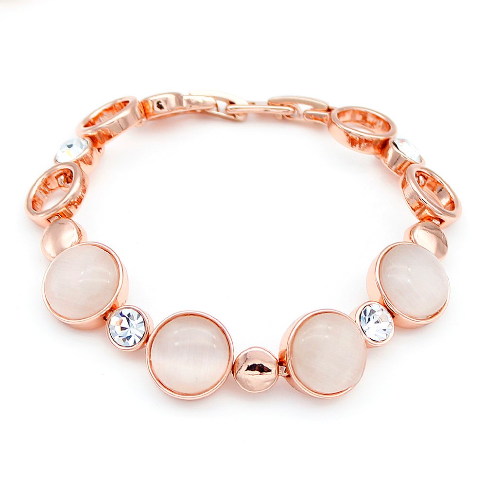 Wholesale circular cat eye bracelet in rose gold plated zinc alloy featuring round cabochons, artificial crystal accents, and fold-over clasp from JuneJewelry.com.