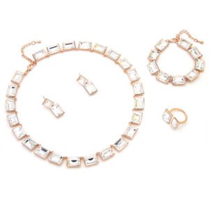 Wholesale emerald cut crystal set in rose gold plated copper featuring purple rectangular premium crystal necklace, earrings, bracelet, and ring from JuneJewelry.com.