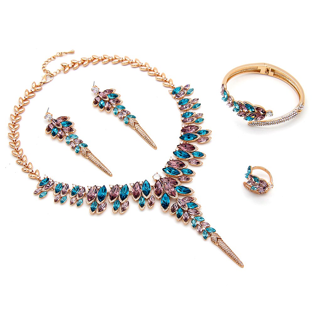 Wholesale leaf crystal jewelry set in rose gold plated copper featuring teal and purple marquise premium crystal necklace, earrings, bangle, and ring from JuneJewelry.com.