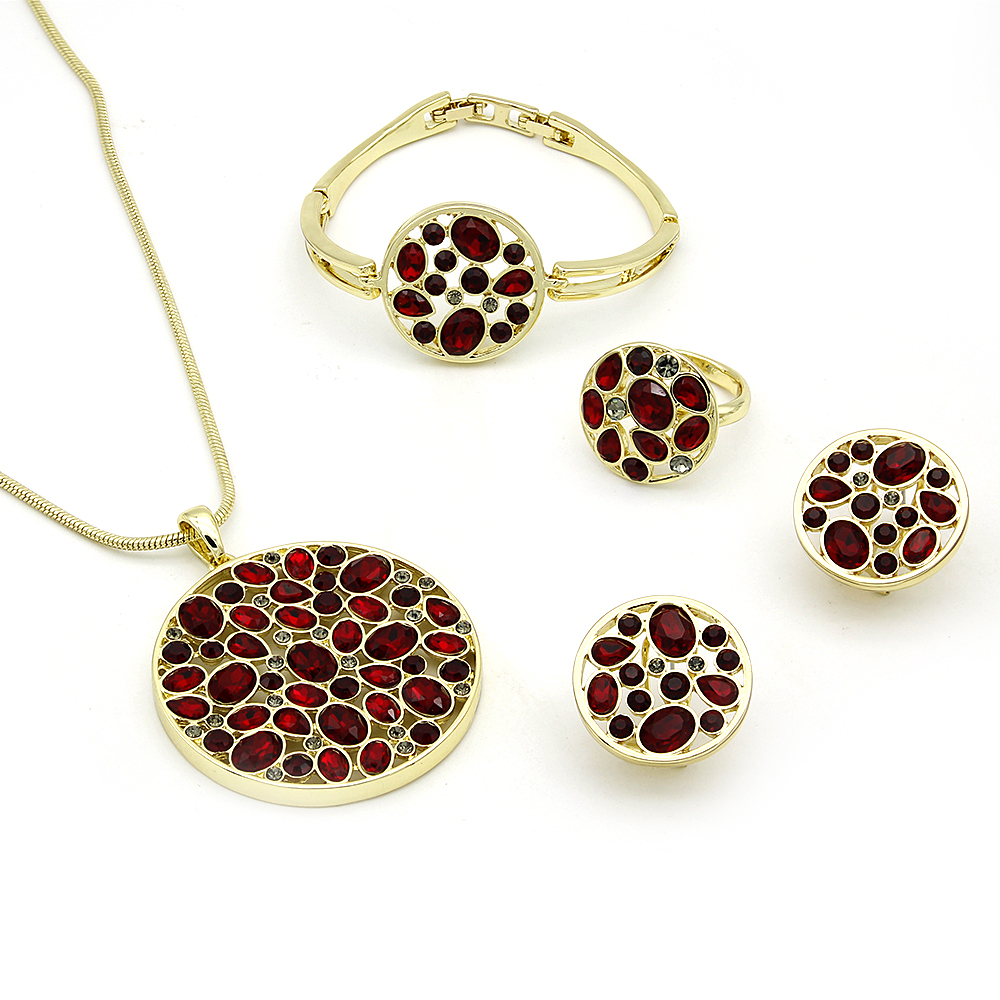 Wholesale red mosaic jewelry set in 18K gold plated copper featuring circular medallion necklace, stud earrings, bangle, and ring with red crystals from JuneJewelry.com.
