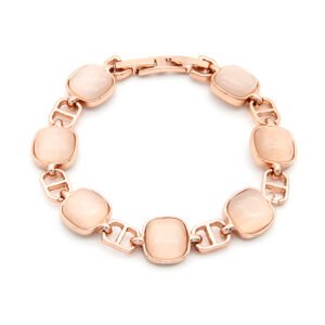 Wholesale oval cat eye bracelet in rose gold plated zinc alloy featuring cushion-oval stones and fold-over clasp from JuneJewelry.com.