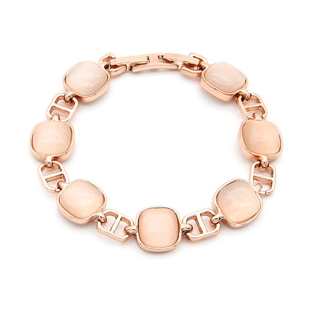 Wholesale oval cat eye bracelet in rose gold plated zinc alloy featuring cushion-oval stones and fold-over clasp from JuneJewelry.com.