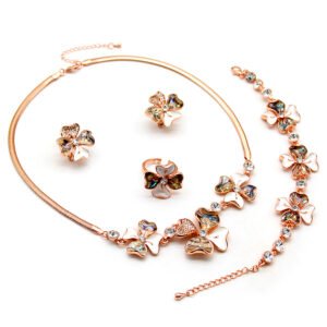 Wholesale clover crystal jewelry set featuring iridescent abalone shell petals, clear premium crystal accents, collar necklace, stud earrings, link bracelet, and ring on rose gold-plated copper from JuneJewelry.com.