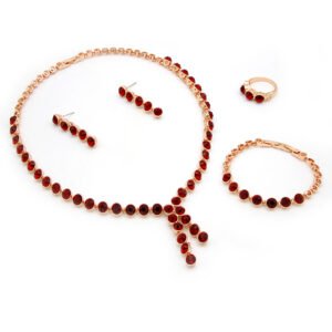Wholesale crystal drop jewelry set featuring clear round premium crystals, lariat necklace, drop earrings, tennis bracelet, and ring on 18K gold-plated copper base from JuneJewelry.com.