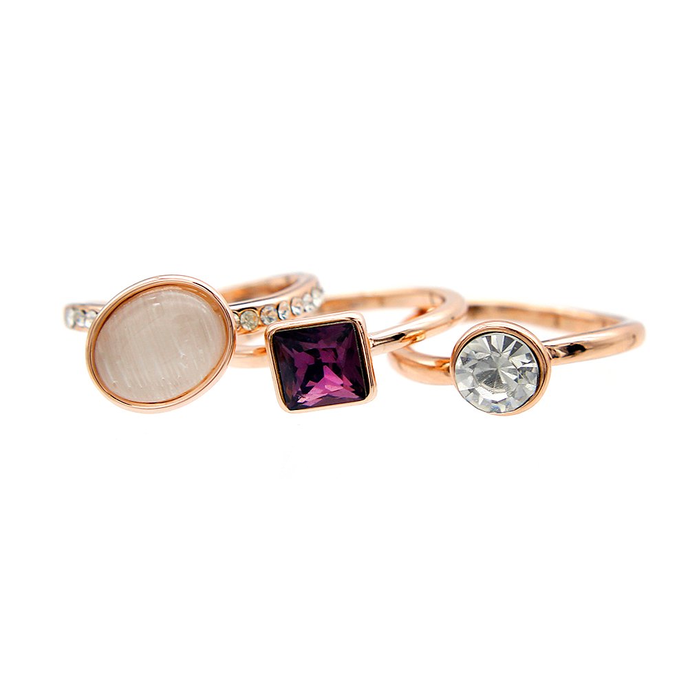 Wholesale stackable stone ring set in rose gold plated zinc alloy featuring an oval cat eye stone ring, square purple crystal, and clear crystal ring from JuneJewelry.com.
