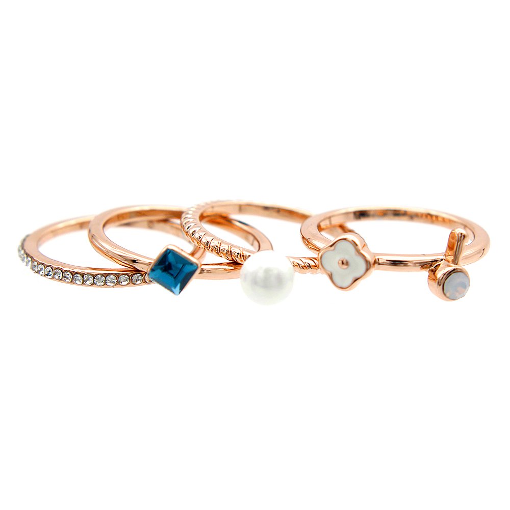 Wholesale mixed charm ring set in rose gold plated zinc alloy featuring five thin bands with blue crystal, pearl, enamel flower, and cat eye stone accents from JuneJewelry.com.