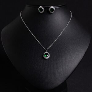 Niche sunburst baguette zircon jewelry set wholesale featuring an oval gemstone surrounded by a sunburst halo of baguette and round cubic zirconia with matching stud earrings from junejewelry.com