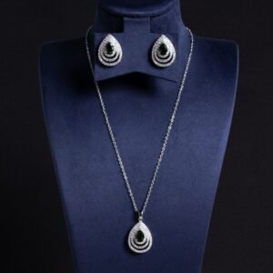 Niche layered teardrop jewelry set wholesale featuring a multi-layer hollow pave cubic zirconia teardrop pendant necklace with matching stud earrings from junejewelry.com