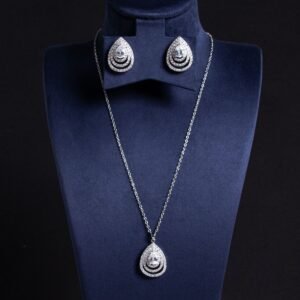 Niche layered teardrop jewelry set wholesale featuring a multi-layer hollow pave cubic zirconia teardrop pendant necklace with matching stud earrings from junejewelry.com