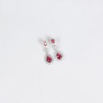Niche double teardrop drop zircon jewelry set wholesale featuring a two-tier teardrop crystal pendant linked by marquise zircons with matching dangle earrings from junejewelry.com