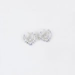 Niche hollow heart crystal jewelry set wholesale featuring an openwork marquise cubic zirconia heart wreath pendant necklace and matching heart earrings from junejewelry.com