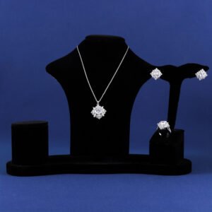 Niche snowflake crystal jewelry set wholesale featuring a central round gemstone surrounded by a cluster of marquise CZ crystals with matching stud earrings and ring from junejewelry.com