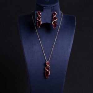 Niche cascading teardrop zircon jewelry set wholesale featuring a vertical geometric arrangement of gradient teardrop stones wrapped in a micro-pave wave with matching drop earrings from junejewelry.com