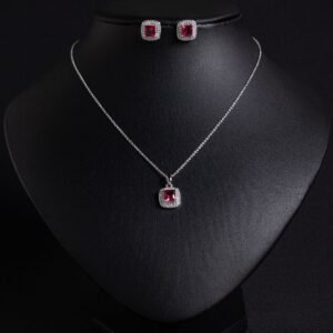 Niche square halo zircon jewelry set wholesale featuring a cushion-cut center gem enclosed by a pave cubic zirconia halo with matching stud earrings from junejewelry.com