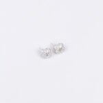 Niche four-leaf clover zircon jewelry set wholesale featuring a micro-pave cubic zirconia clover motif with a central pinwheel star icon and matching stud earrings from junejewelry.com