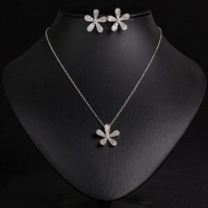 Niche five petal flower jewelry set wholesale featuring a delicate micro-pave CZ five petal blossom pendant necklace and matching flower stud earrings from junejewelry.com