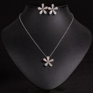 Niche five petal flower jewelry set wholesale featuring a delicate micro-pave CZ five petal blossom pendant necklace and matching flower stud earrings from junejewelry.com
