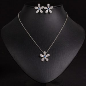 Niche five petal flower jewelry set wholesale featuring a delicate micro-pave CZ five petal blossom pendant necklace and matching flower stud earrings from junejewelry.com