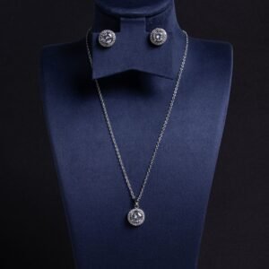 Niche round halo zircon jewelry set wholesale featuring a brilliant round-cut central crystal surrounded by a pave cubic zirconia halo with matching stud earrings from junejewelry.com