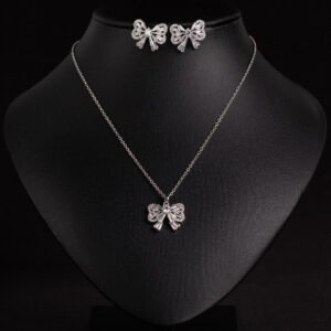 Niche bowknot crystal jewelry set wholesale featuring a sparkly baguette cubic zirconia ribbon bow pendant chain necklace and matching stud earrings from junejewelry.com