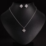 Niche geometric square zircon jewelry set wholesale featuring four princess-cut crystals arranged in a diamond-oriented quad setting with matching stud earrings from junejewelry.com