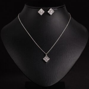 Niche geometric square zircon jewelry set wholesale featuring four princess-cut crystals arranged in a diamond-oriented quad setting with matching stud earrings from junejewelry.com