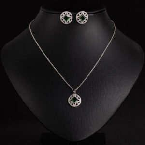 Niche circular starburst zircon jewelry set wholesale featuring a round openwork starburst pendant centered with a princess-cut crystal and matching stud earrings from junejewelry.com