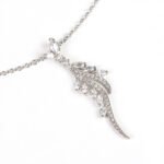 Niche wheat ear zircon tassel jewelry set wholesale featuring a sweeping marquise cubic zirconia wheat ear motif pendant necklace with matching drop earrings from junejewelry.com