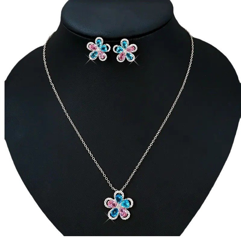 LJT89630 (2) Niche five petal flower zircon jewelry set wholesale featuring a five-petal floral motif made of halo-framed pear cubic zirconia gems with matching stud earrings from junejewelry.com