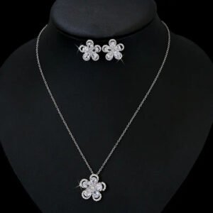 Niche five petal flower zircon jewelry set wholesale featuring a five-petal floral motif made of halo-framed pear cubic zirconia gems with matching stud earrings from junejewelry.com