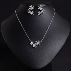 Niche snowflake flower zircon jewelry set wholesale featuring clustered baguette cubic zirconia starburst snowflake blossoms with matching stud earrings from junejewelry.com