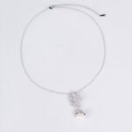 Enhance your online inventory with romantic elegance by adding our Floral pearl drop jewelry set wholesale, available at junejewelry.com. As shown in image LY5561 (4).jpg, this two-piece set artfully combines delicate botanical brilliance with classic luster. Built on an eco-friendly, tarnish-resistant platinum-plated copper base (100% lead, nickel, and cadmium free), each piece features a detailed cluster of tiny pave-set cubic zirconia blossom flowers anchored by a luminous, dangling synthetic pearl drop, paired with matching cluster drop earrings. Presented in brilliant Crystal Clear, this whimsical floral set elevates everyday commuting ensembles, wedding celebrations, formal banquets, and travel wardrobes alike. B2B buyers enjoy exceptional high quality craftsmanship at a cheap factory price designed to maximize retail margins. Order directly on junejewelry.com to benefit from export-grade packaging and free shipping on qualifying bulk wholesale purchases!