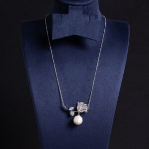 Light luxury rose pearl necklace wholesale featuring a pave CZ rose flower branch with a dangling white pearl pendant chain necklace from junejewelry.com
