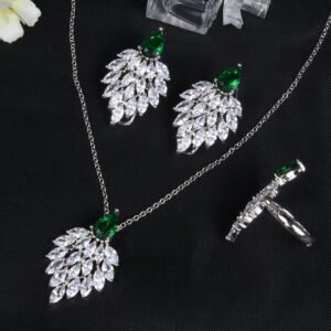 Niche feather crystal cluster jewelry set wholesale featuring marquise CZ leaf cluster pendants topped with pear-cut colored gemstones with matching earrings and ring from junejewelry.com