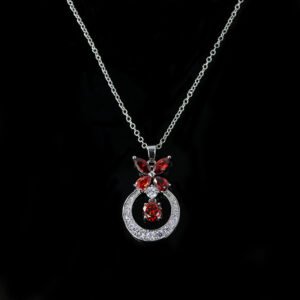 Niche butterfly crystal necklace wholesale featuring a marquise cubic zirconia butterfly top with a micro-pave crescent hoop and suspended solitaire CZ stone from junejewelry.com