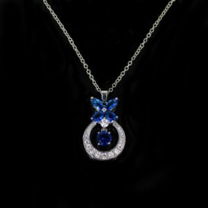 Niche butterfly crystal necklace wholesale featuring a marquise cubic zirconia butterfly top with a micro-pave crescent hoop and suspended solitaire CZ stone from junejewelry.com