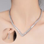 Square CZ V-necklace set wholesale including V-shaped tennis necklace and matching linear dangle drop earrings featuring princess-cut cubic zirconia on 18K gold and palladium plated copper base.